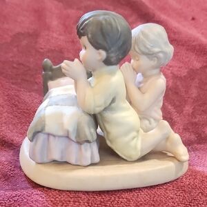 Porcelain Figurine of Children Praying